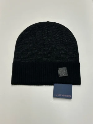 Lv Mössa - Helt ny aldrig använd. Storlek One size. Snabb frakt fraktar inom 24h.