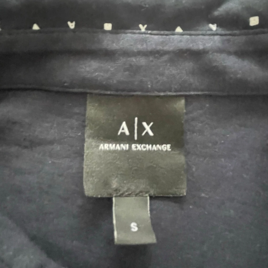Svart prickig polotopp från Armani Exchange - 1