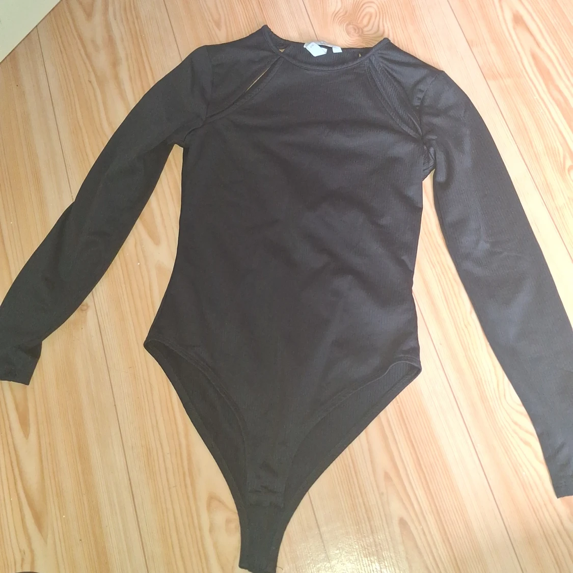 Svart långärmad bodysuit