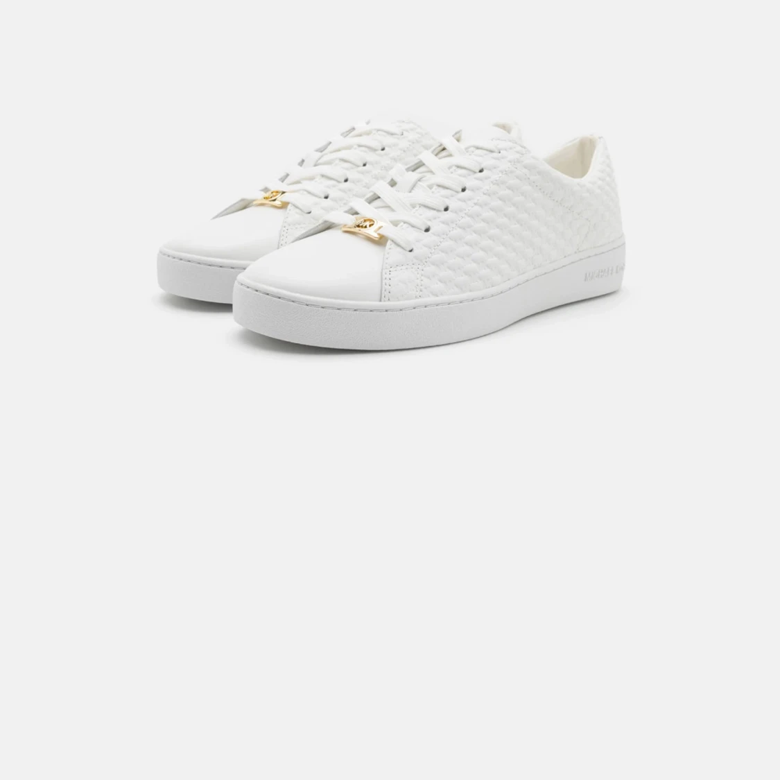 Vita sneakers från Michael Kors