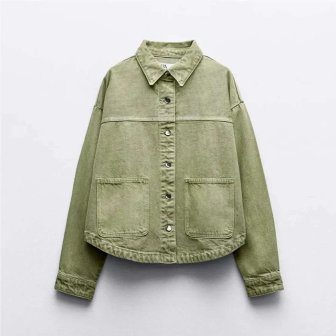 Grön jacka i jeansmaterial