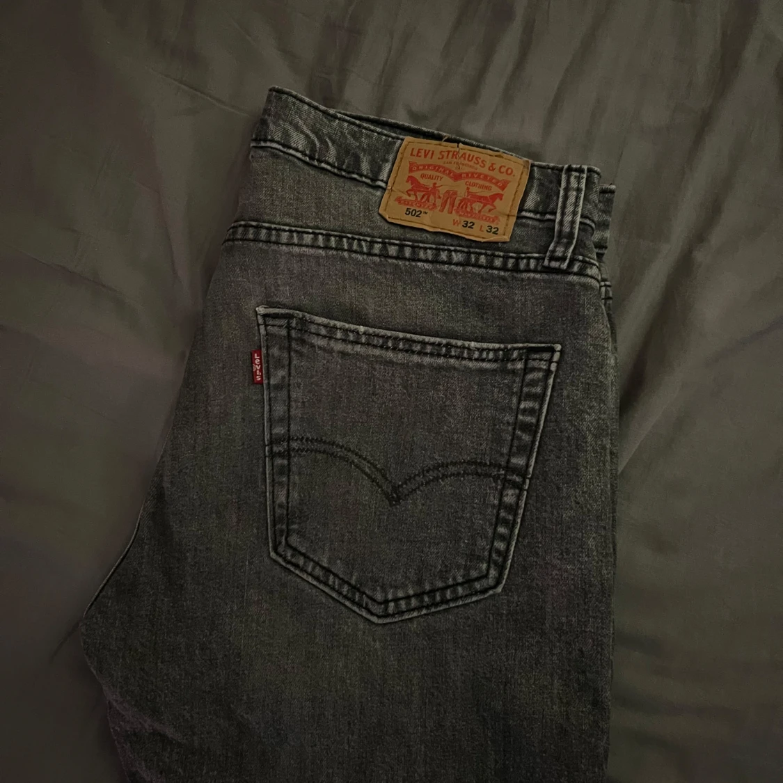 Levi's 502 svarta jeans W32 L32