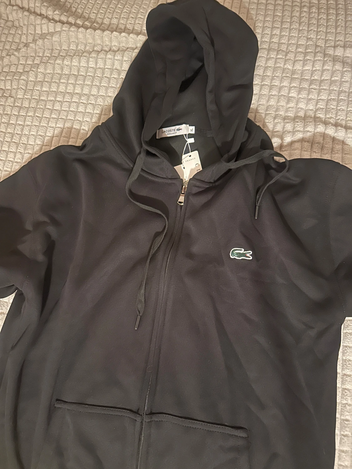 Svart hoodie från Lacoste XL