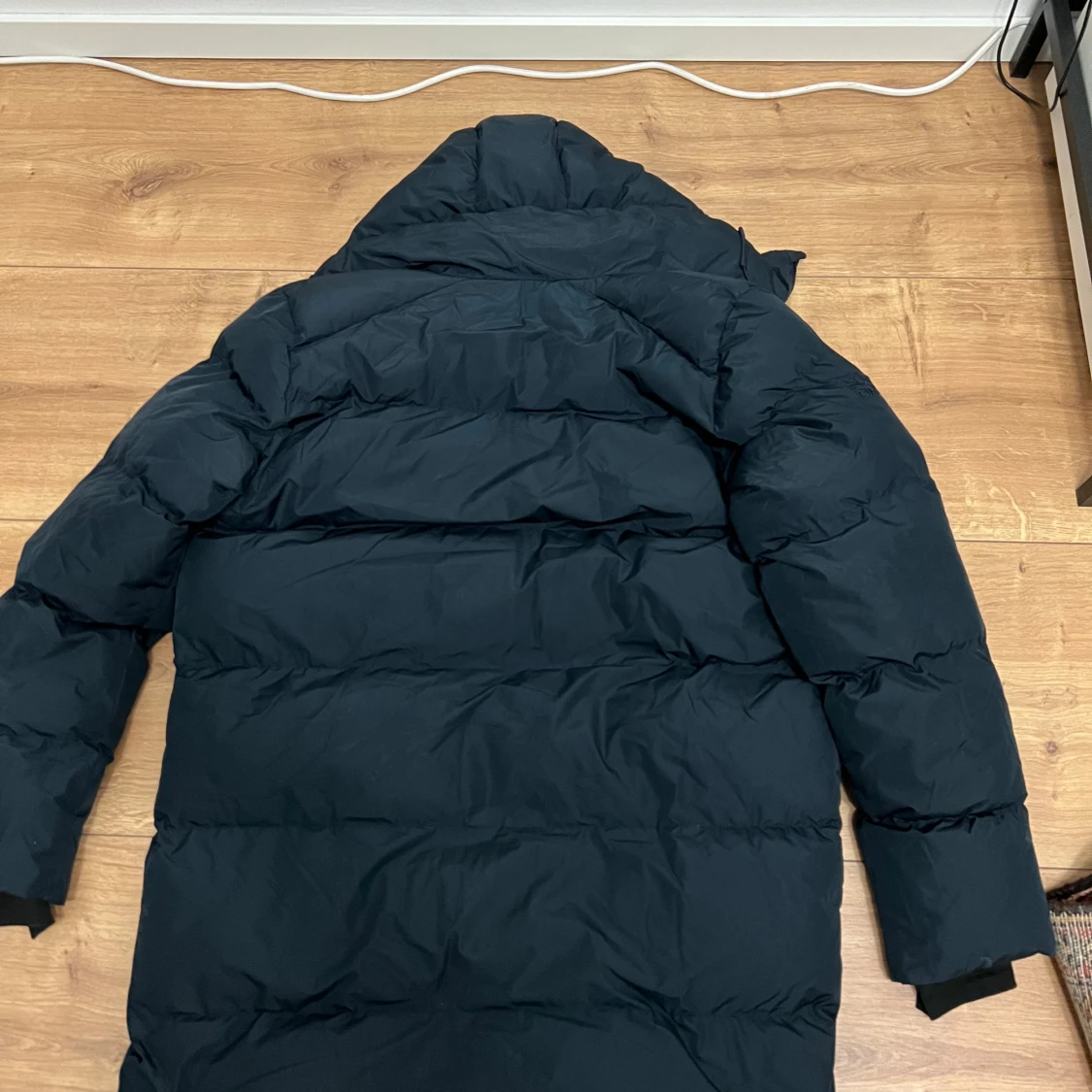 Mörkblå lång pufferjacka Superdry - 1