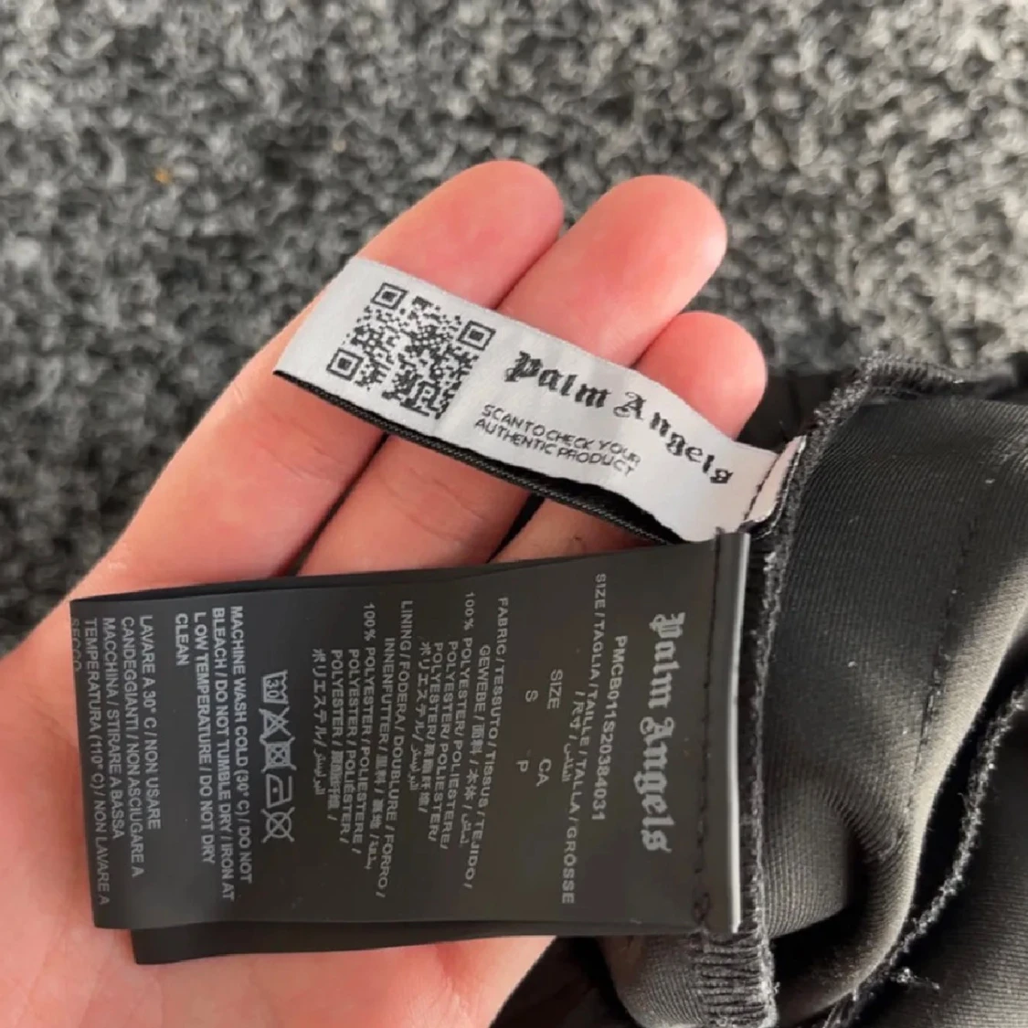 Palm Angels svarta mjukisbyxor med vita ränder - 1