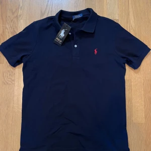 Ralph Lauren Piké Blå - Blå Ralph Lauren piké, ny med tags