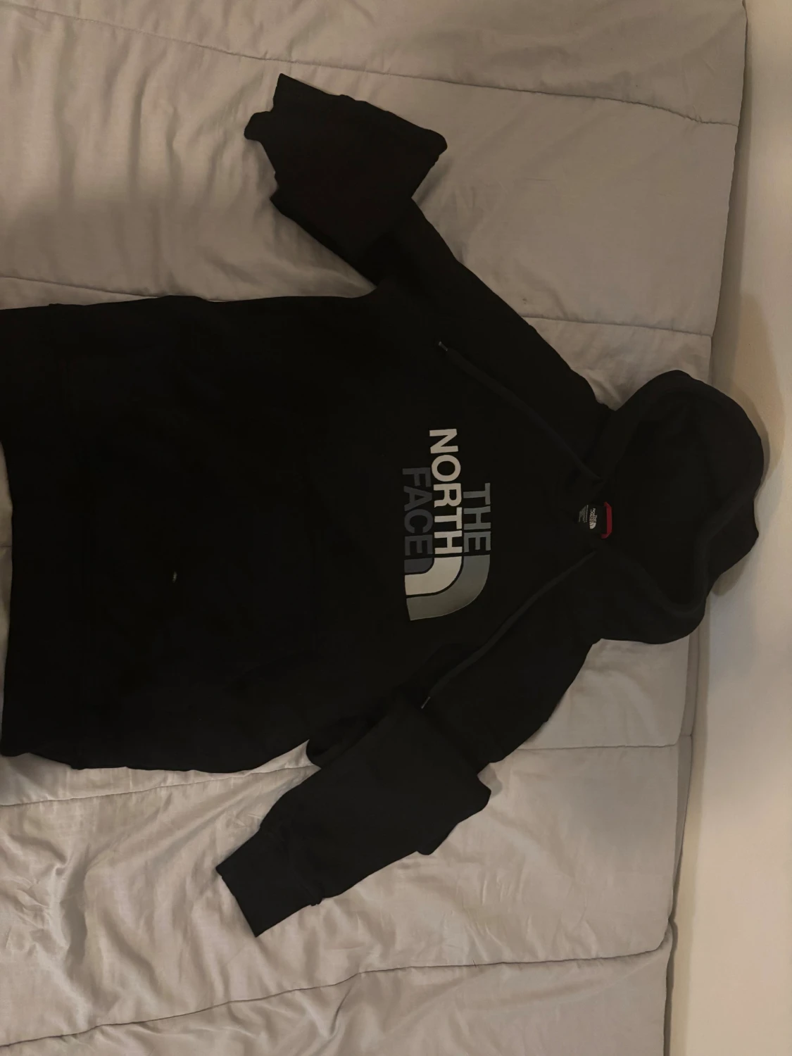 Svart hoodie från The North Face