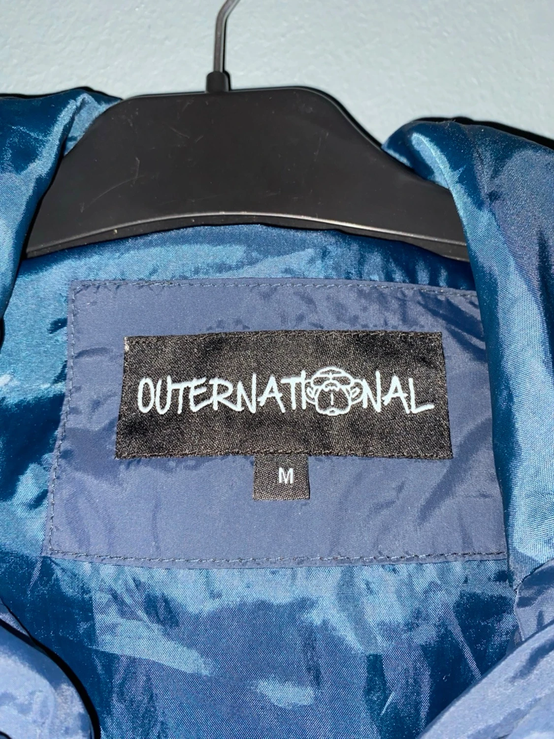 Vindjacka från Outernational i navy och beige - 3