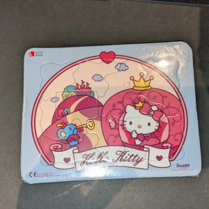 Tre hello Kitty pussel - Tre hello Kitty pussel, två oöppnade ett i mycket bra skick öppnat