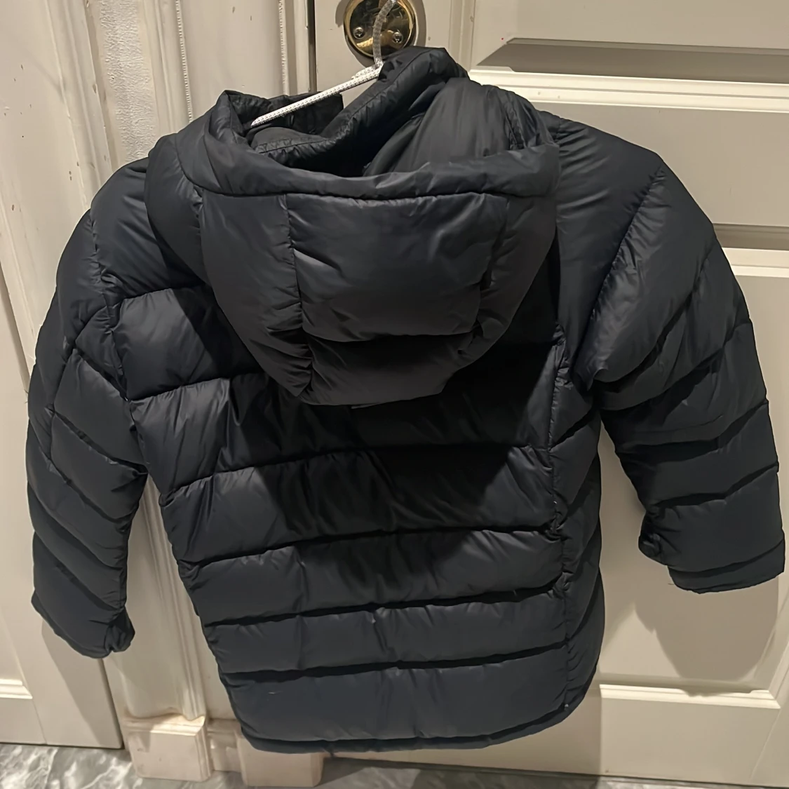 Svart dunjacka Peak Performance storlek 150 - 3