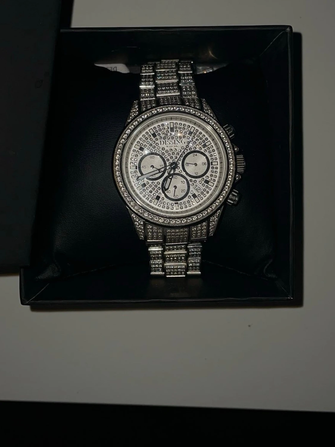 Glittrig silverklocka från Dissing