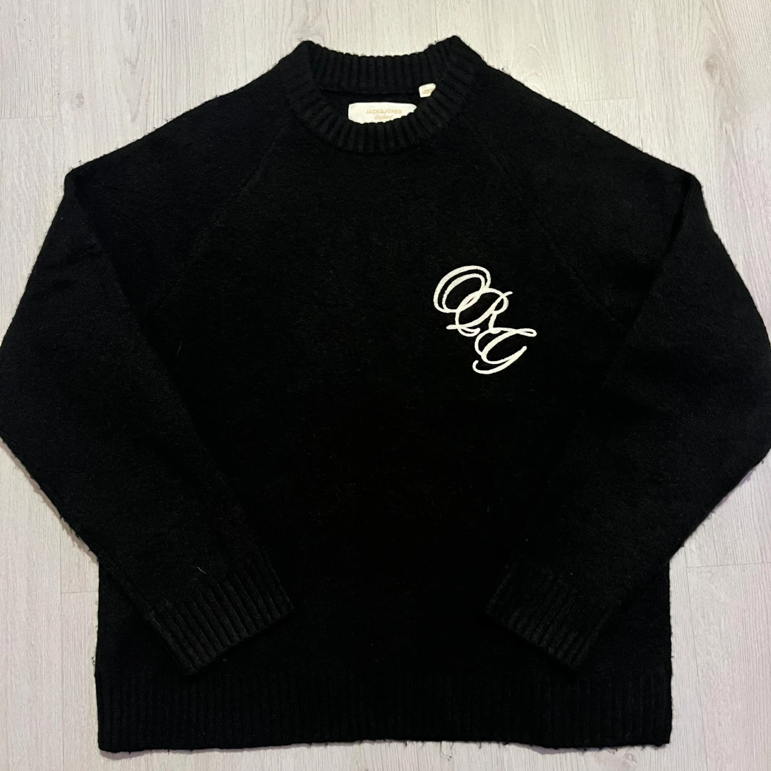 Svart stickad tröja