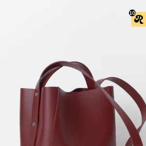 Vinröd väska Gina Tricot - Säljer en jättefin rymlig vinröd väska ifrån Gina Tricot som jag aldrig använt, köpte den för 300kr. Kan skicka egna bilder bara att fråga 😇