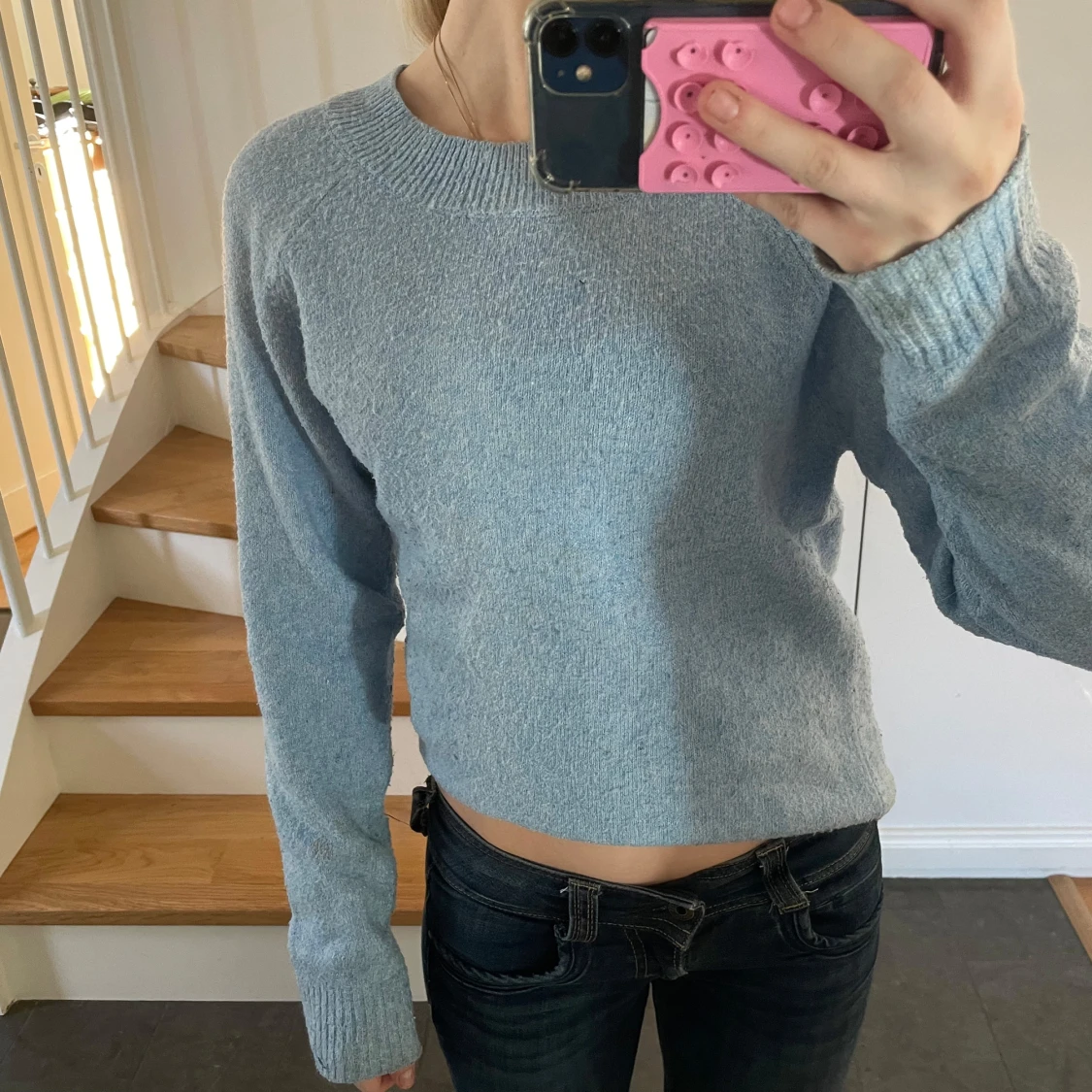 Ljusblå stickad tröja