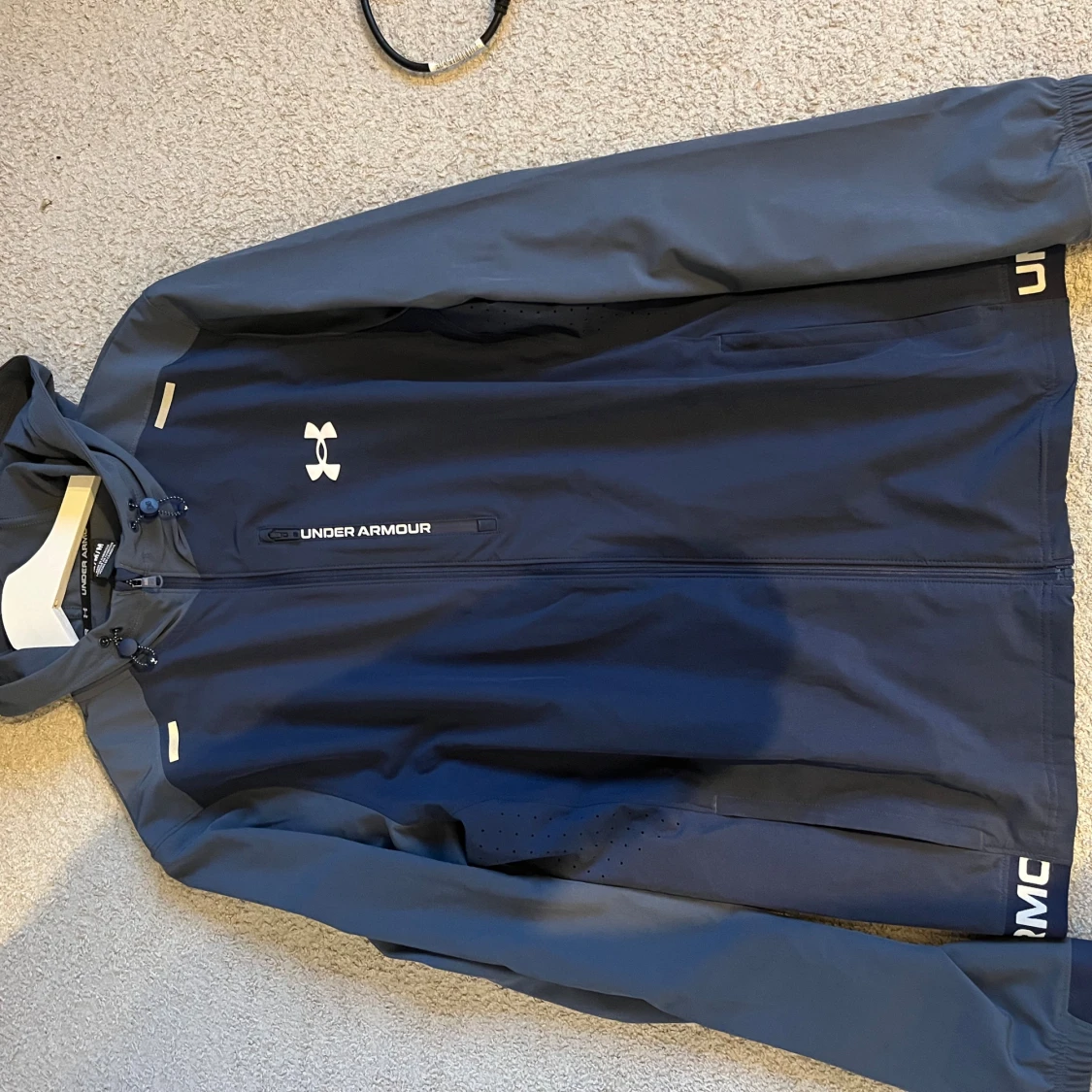 Blå vindjacka från Under Armour M