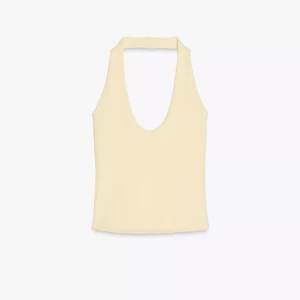 Gul Zara topp - Supersnygg ljusgul halterneck topp med ribbad struktur och djup urringning från Zara. I nyskick aldrig använd. I stl M. Prislapp kvar❤️