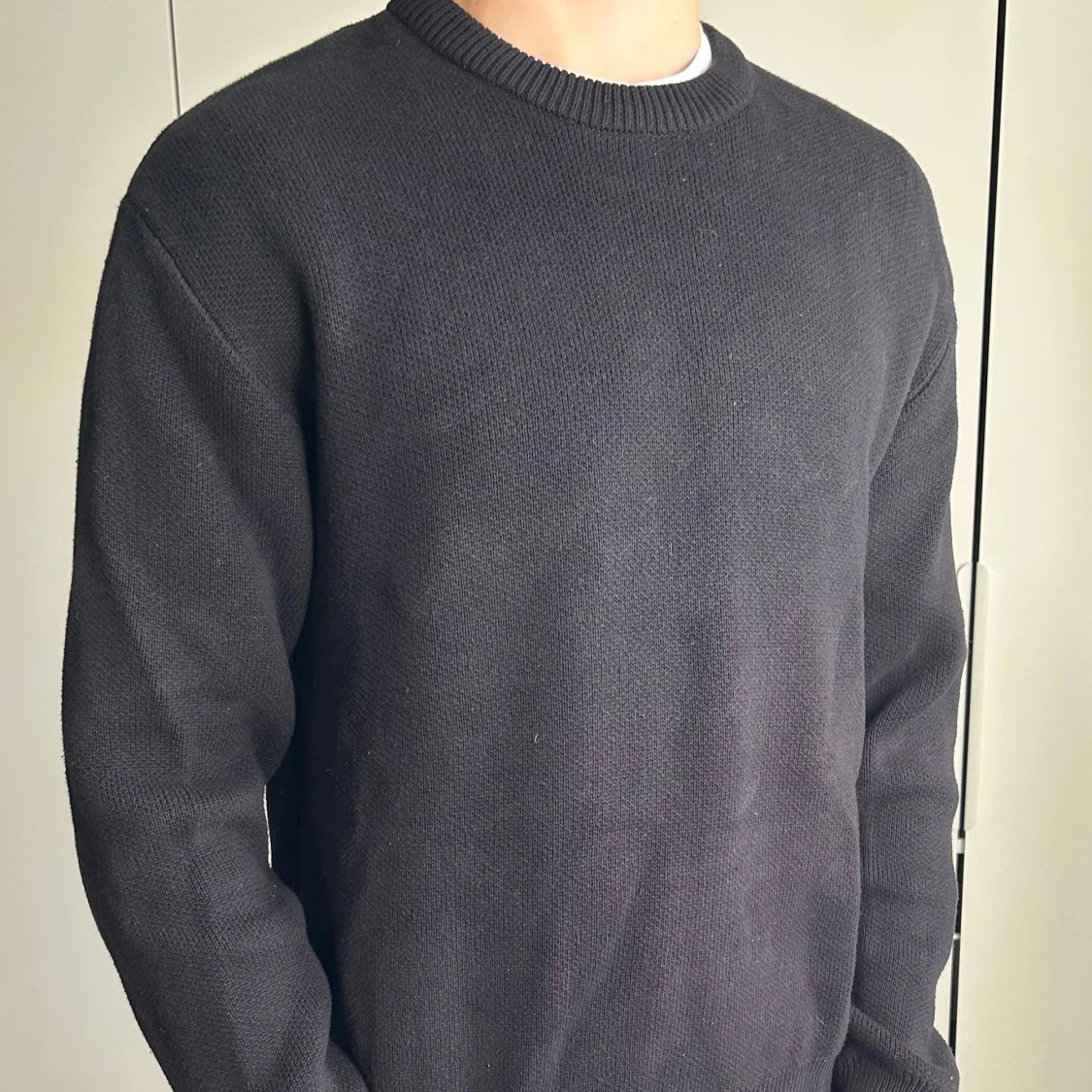 Svart stickad tröja