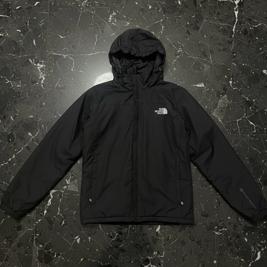 Svart vindjacka från The North Face