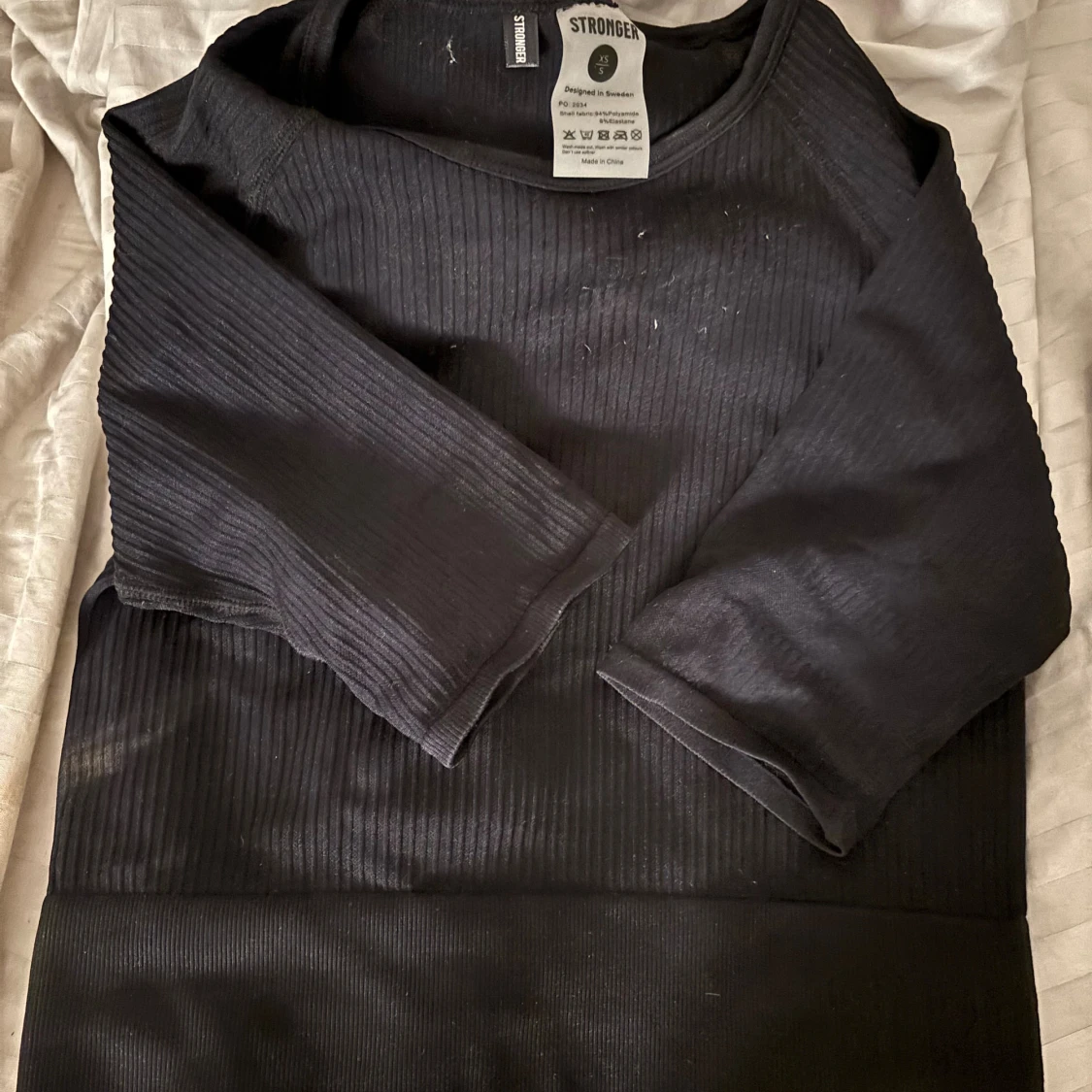 Svart ribbad träningströja Stronger XS/S