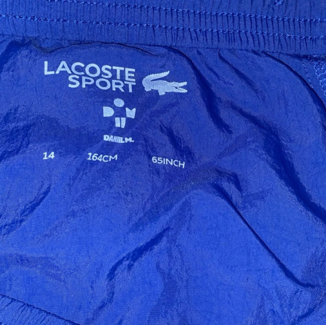 Blå täckbyxor från Lacoste Sport - 3