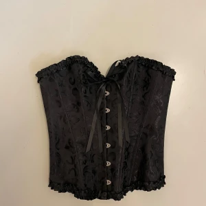 Svart korsett  - Endast använd en gång 