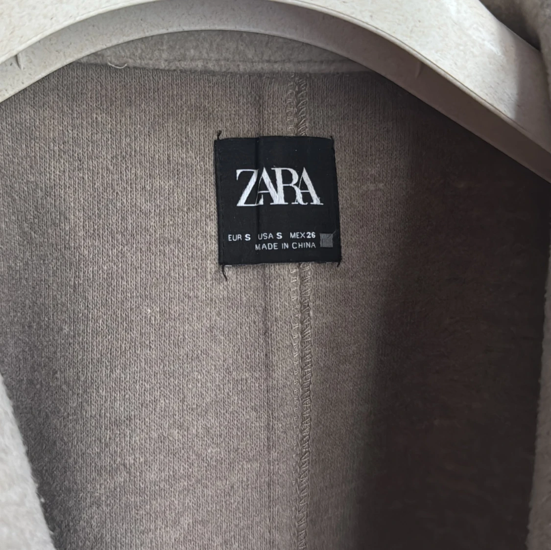Beige kappa från Zara  - 2