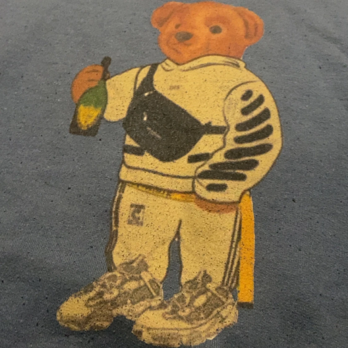 Blå sweatshirt med nalletryck - 1