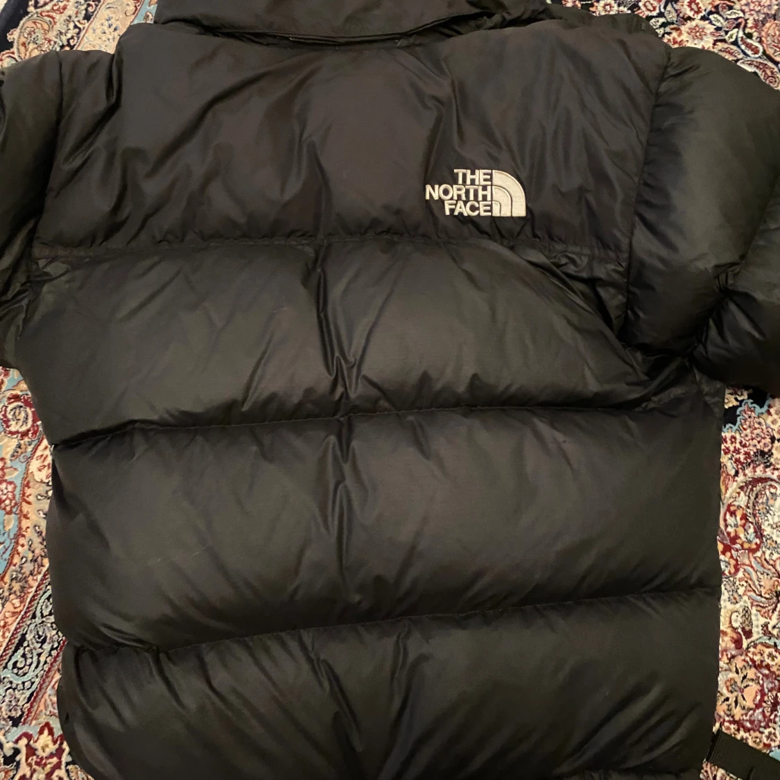 Svart dunjacka från The North Face S - 1