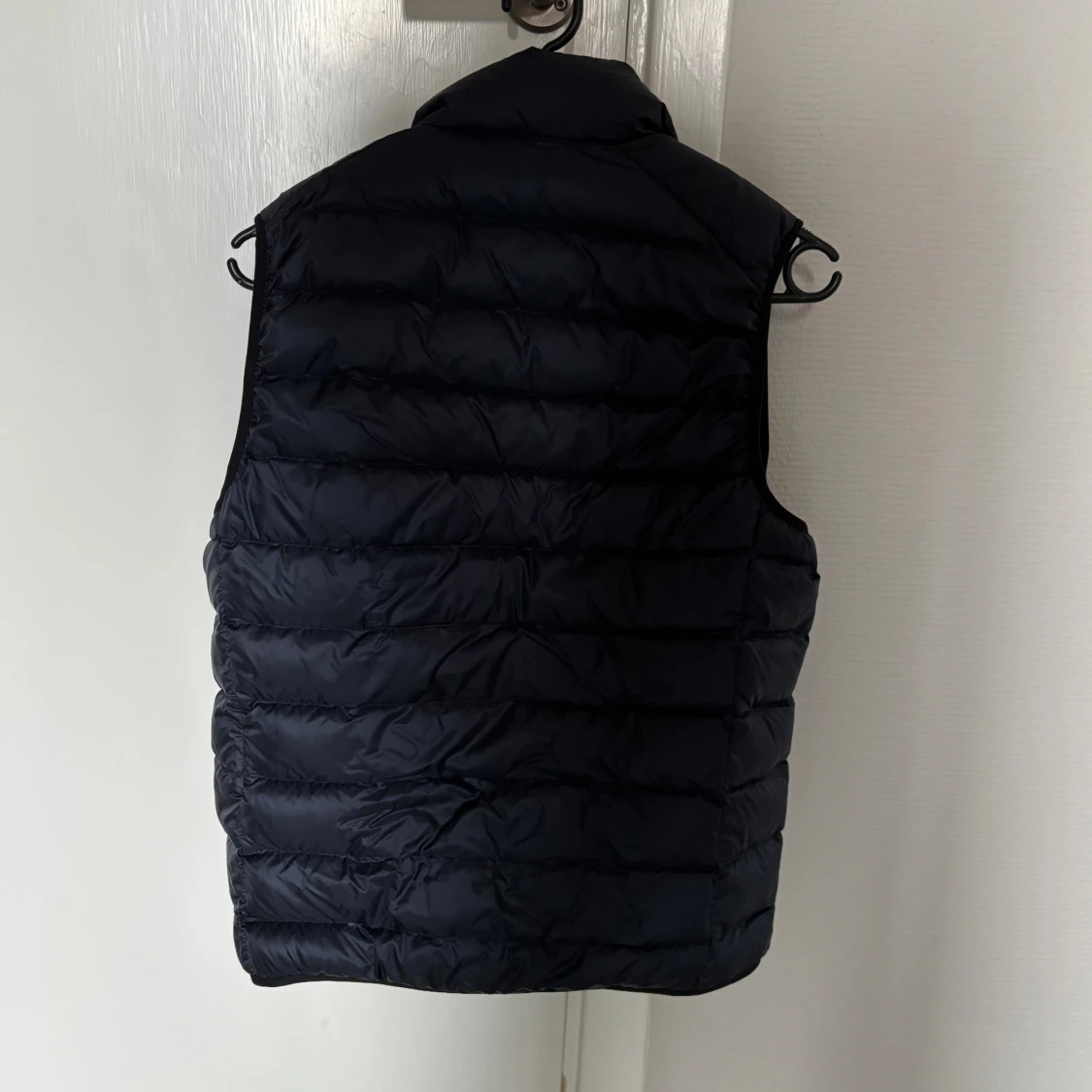 Mörkblå dunväst med dragkedja - 1