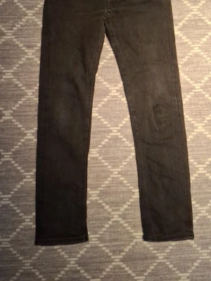 Lee jeans daren Button fly 32/34 - Svarta Lee daren i bra skick. W32 l34 