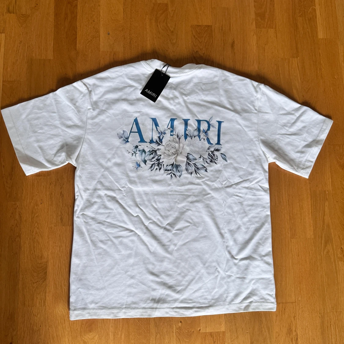Vit blommig t-shirt från Amiri