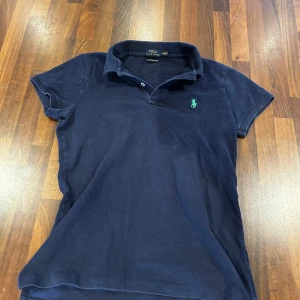 Ralph Lauren pike - Ralph lauren pike. Skick 9/10. Står Medium men passar mer som XS