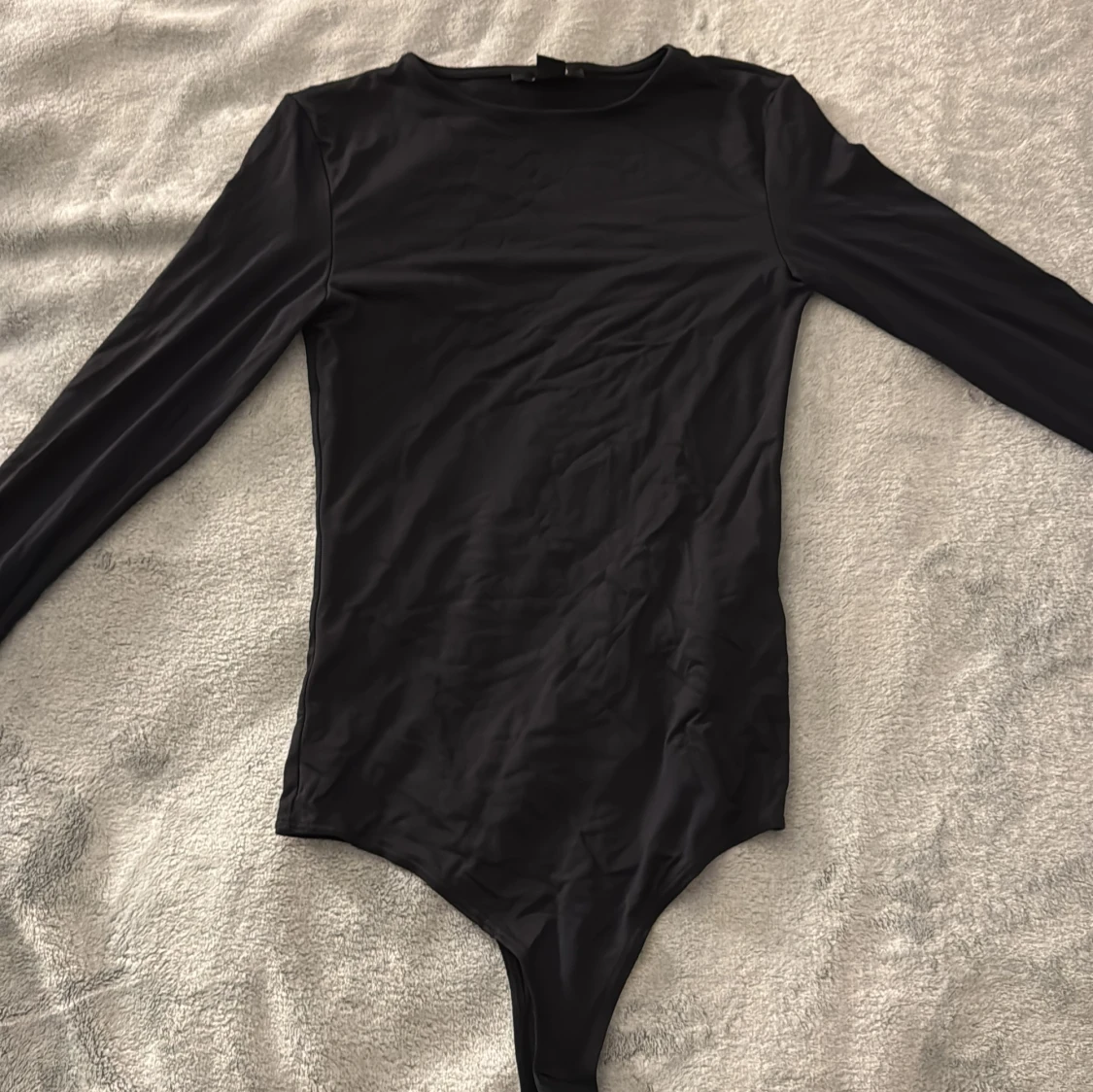 Svart långärmad body från Amisu XS