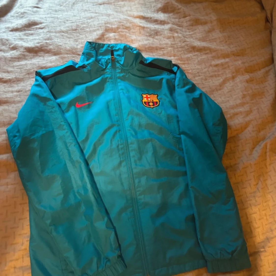 Turkos Nike FC Barcelona vindjacka 158-170