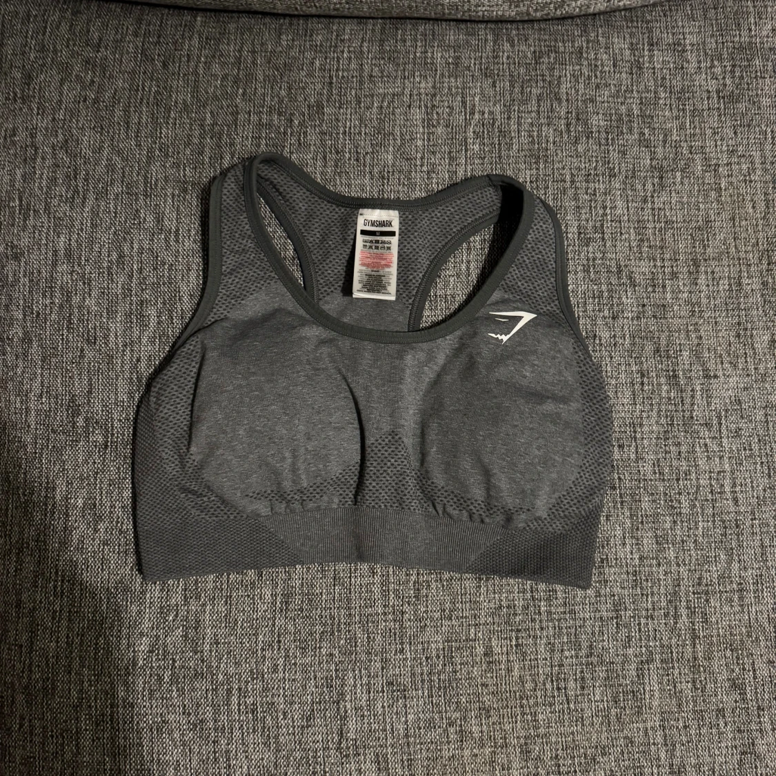 Mörkgrå sporttopp från Gymshark