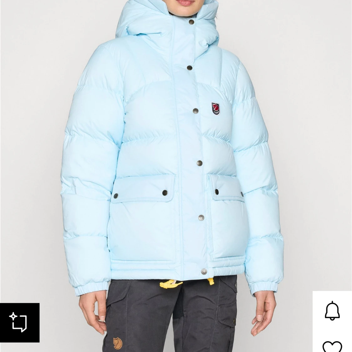 Ljusblå pufferjacka från Fjällräven