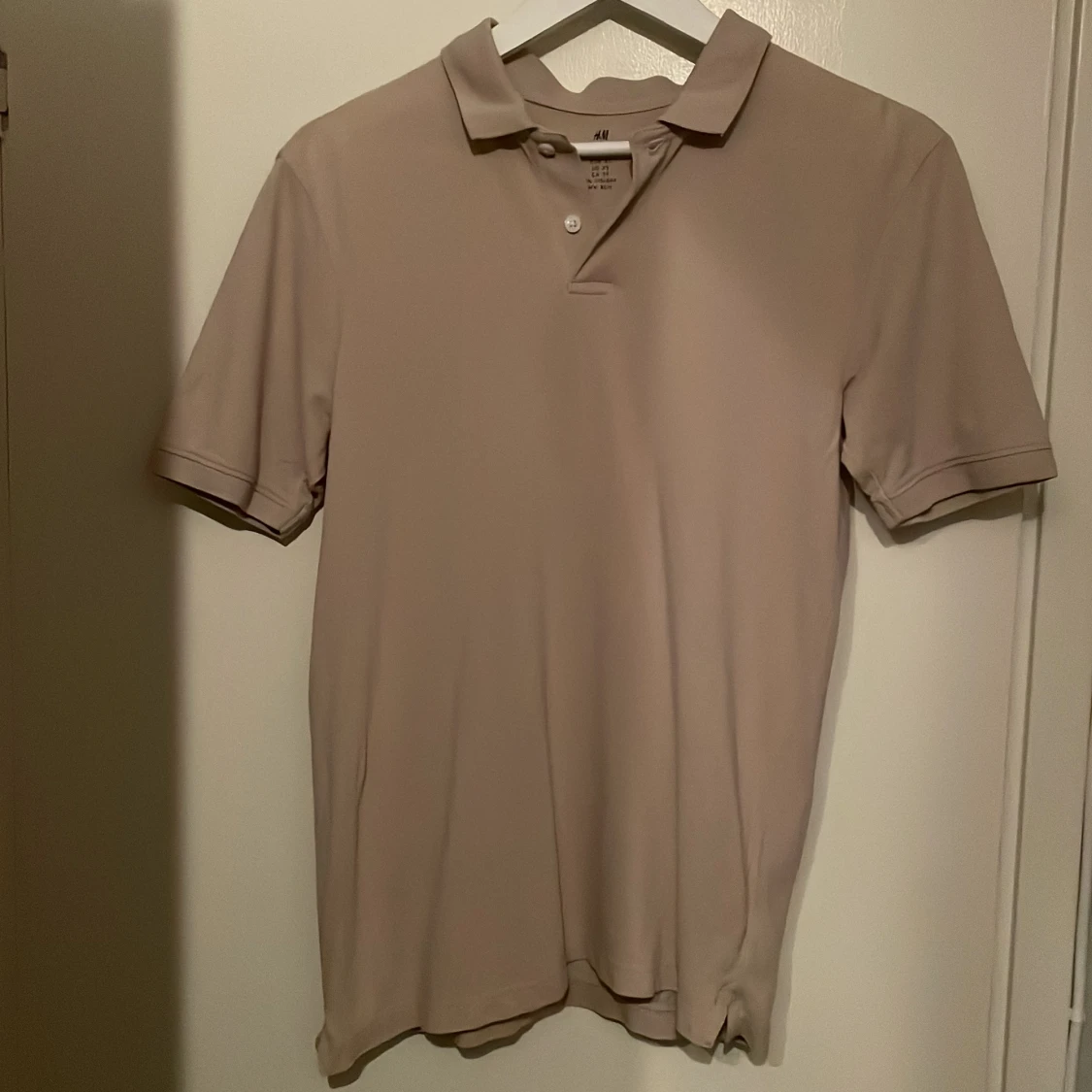 Beige pikétröja från H&M XS