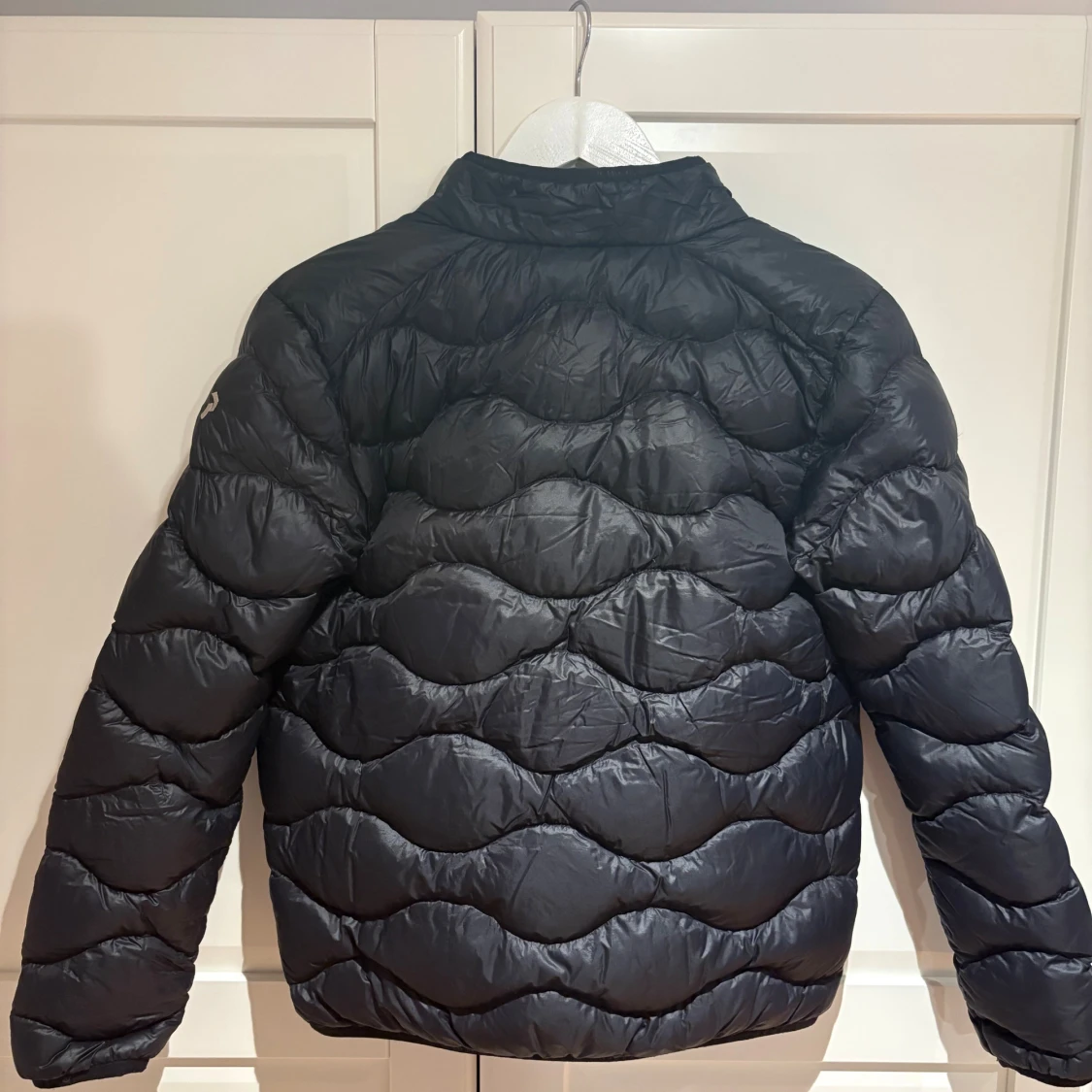 Svart dunjacka från Peak Performance - 2