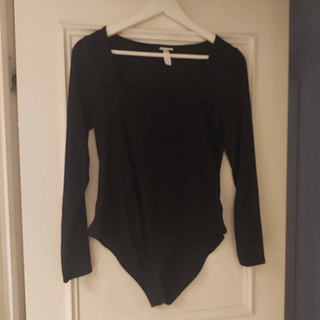 Svart långärmad bodysuit från H&M
