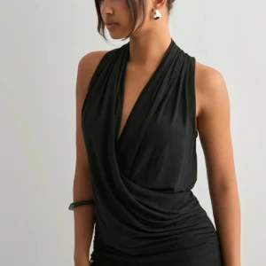 Svart omlott topp - Använd en gång 