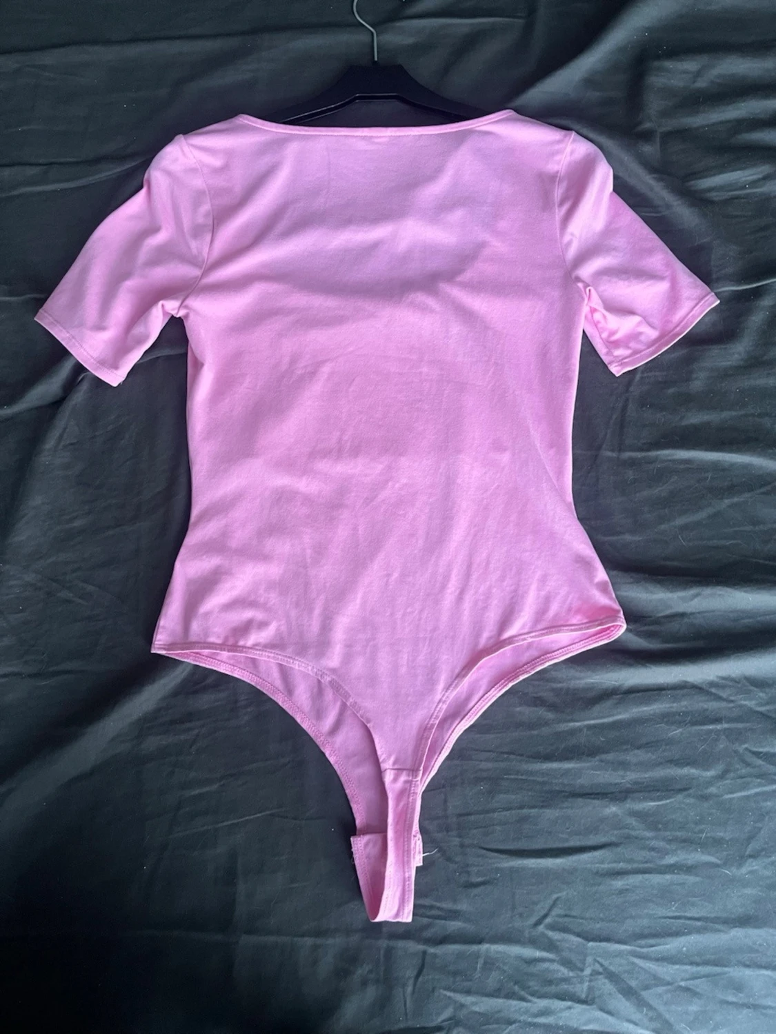 Ljusrosa body med kort ärm - 1