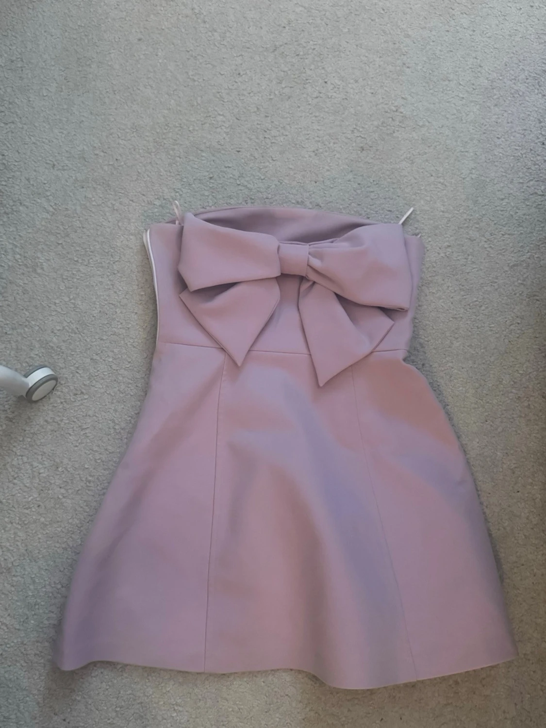 Rosa klänning med rosett