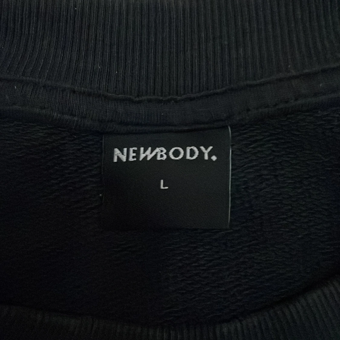 Svart sweatshirt från Newbody L - 1