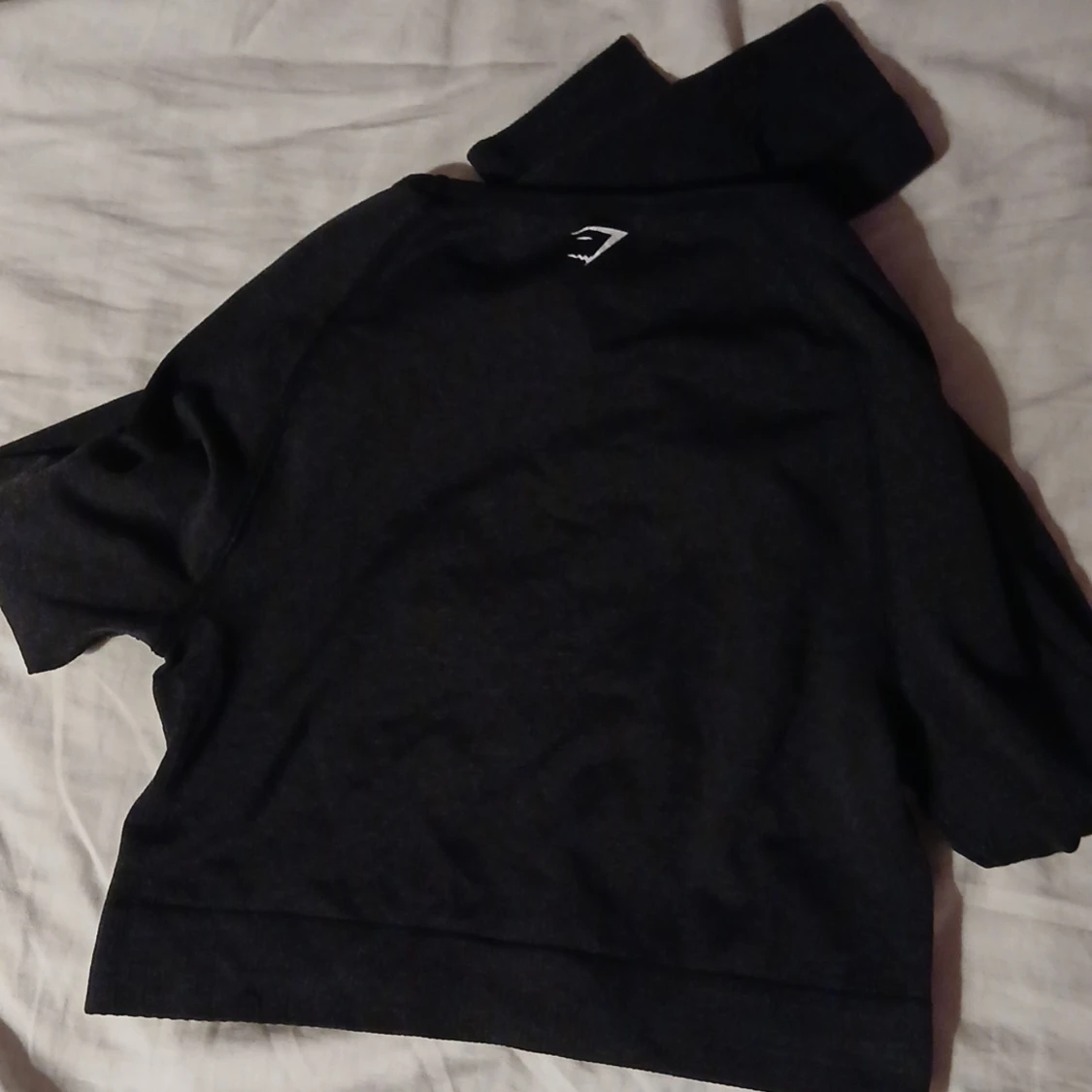 Svart långärmad crop top från Gymshark - 2