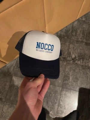 Nocco Keps  - Exklusiv keps från Nocco. Använd endast ett fåtal gånger och är i mycket bra skick 🤩Priser är självklart diskutabelt ✌️