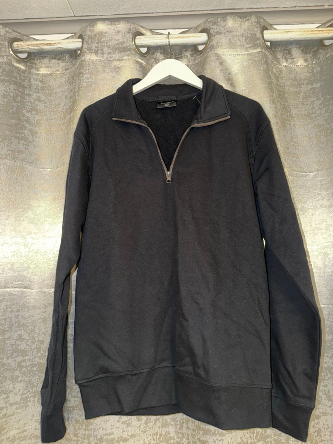 Svart half zip sweatshirt