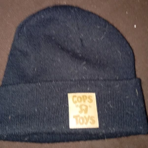 7th Letter. Cops R Toys  - Cops R Toys