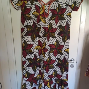 Afrikanska klänning - Snygg afrikanska klänning  Hemma syd helt ny storlek XL