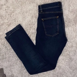 nudie jeans - Säljer dessa feta nudie jeans i modellen lean dean, storlek 28/30