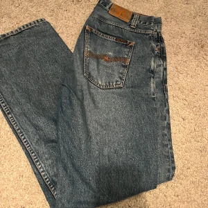 Nudie jeans - Nudie jeans  Modell gritty jackson i storlek 31/32